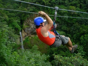 Man zip lining in Costa Rica