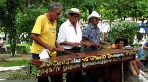 Three men playing a Marimba in Costa Rica