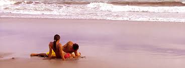 People enjoying Costa Rica on the beach - the sun