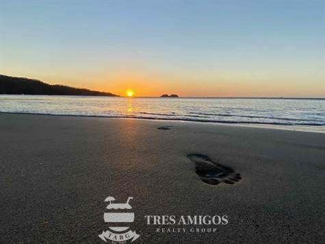 Footprint in the sand at sunset Playa Hermosa